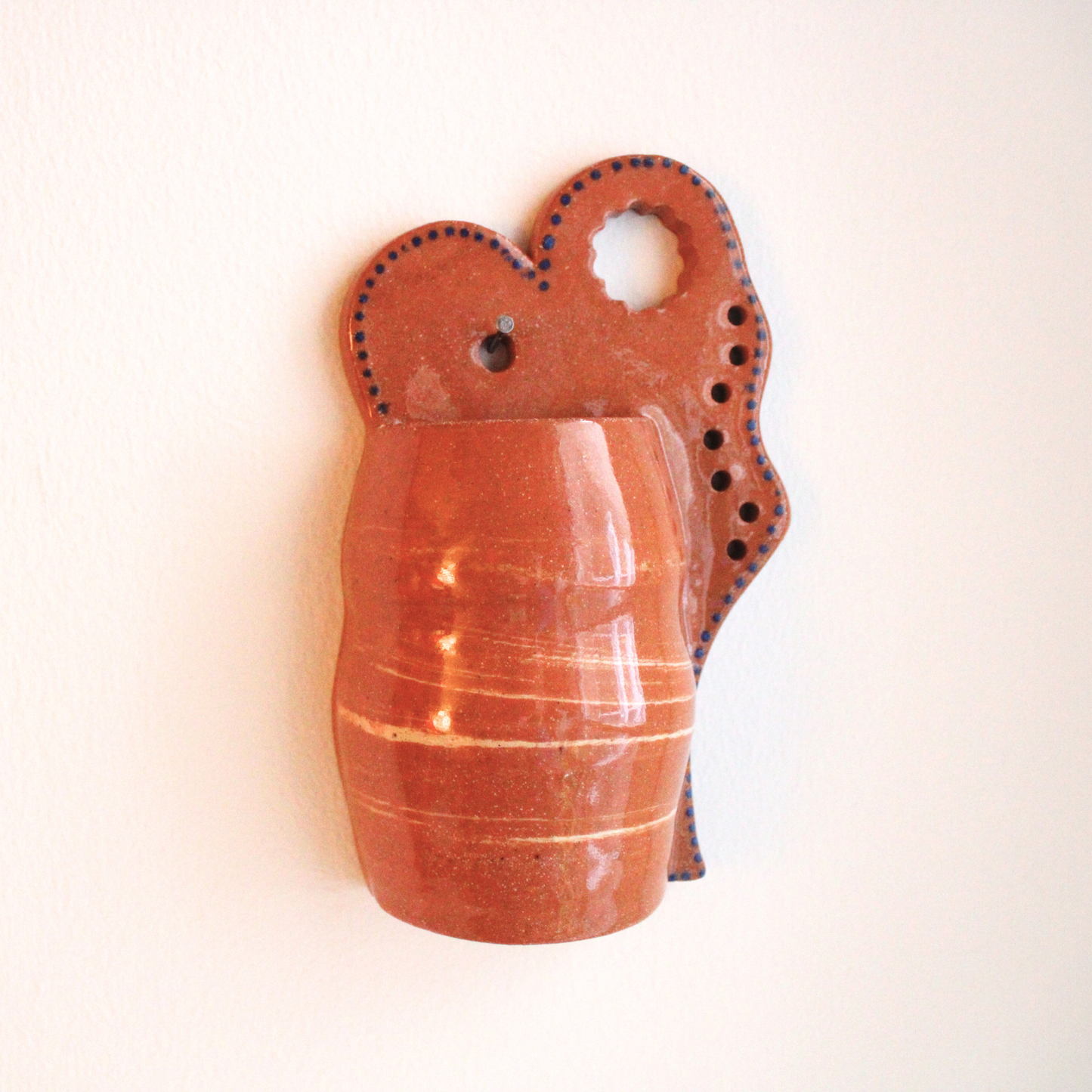 Medallion wall pocket