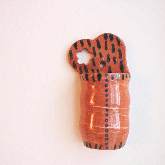 Cutout flower wall pocket